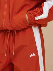 MUSERA Quần thể thao ống rộng bằng nylon có dây rút ở eo, phối màu tương phản, chỉ bao gồm quần. Thích hợp cho sân bay, phong cách thường ngày. Phù hợp cho Giáng sinh, mùa đông và mùa hè. - trái cam - Xem 5