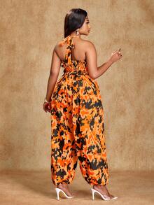 Brilight 女士日常休闲装，适合假日、通勤、度假和音乐节等场合。波西米亚风无袖连体裤，蝴蝶结系带露背领口，收腰设计，饰有印花图案。女士春夏装。 - 橘色 - 查看 2