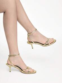 Mnmlis Sandalias de tacón de aguja con tiras cruzadas de metal para mujer - Oro claro - Ver 8