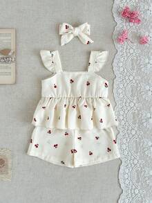 SHEIN 两件套女婴夏季套装，可爱樱桃印花吊带背心搭配松紧腰短裤和发带，柔软舒适，适合春夏外出，是送给6个月至3岁宝宝的绝佳礼物。 - 杏色 - 查看 4