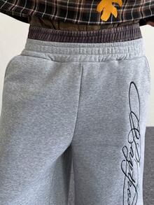 PAVTROS Quần nỉ nam phong cách đường phố 2 trong 1, cạp chun, thêu logo tiếng Anh, thích hợp cho các lễ hội âm nhạc ngoài trời, dạo phố, làm quà tặng cho bạn trai/chồng, kỷ niệm, màu xám nhạt, quần nỉ nam họa tiết đường phố, quần short ống rộng màu xám nam, quần short dáng rộng nam. - Nhiều màu - Xem 3