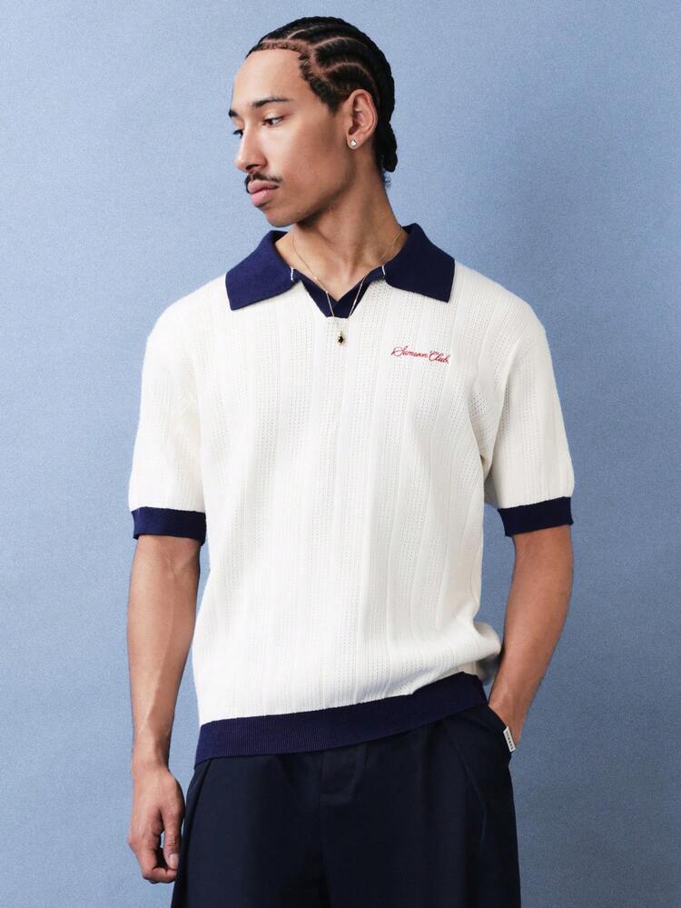 Polo de malha canelada com gola contrastante