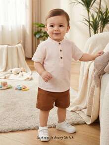 Cozy Pixies Bộ 2 món cho bé trai: Áo thun ngắn tay cổ tàu và quần short cạp chun, chất liệu vải có họa tiết, màu trơn. - Nhiều màu - Xem 1