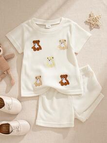 Souflis Souflis 男婴卡通熊刺绣圆领短袖上衣搭配纯棕色短裤，风格活泼，适合日常穿着、户外活动和舒适的居家穿着，轻松打造可爱的儿童装扮。 - 杏色 - 查看 2