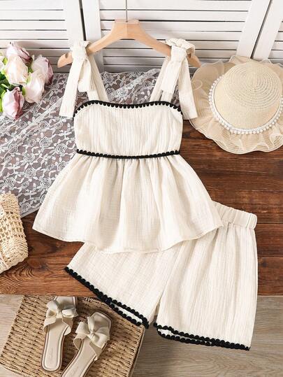 SHEIN Sparklyn 2-Piece Girls' Summer Casual Fashion Set Classic Comfortable Ensemble White 100% Cotton Tie-Front Off-Shoulder Top With Black Lace Embroidered Ruffles Paired With White Shorts Ideal For Everyday Wear, Shopping, Beach Outings, Vacations, And More