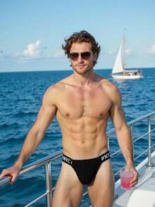 Manfinity Swimmode 男士夏季海滩度假风字母印花黑色泳裤 - 黑色 - 查看 3