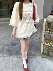 DAZY Women's Loose Slogan & Cartoon Print Round Neck Drop Shoulder T-Shirt - Apricot - View 1