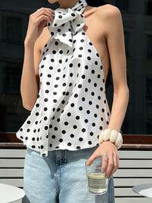 Pariaura 2026新款女士衬衫，优雅波点印花露背吊带无袖上衣，露背设计配蝴蝶结细节，丝滑缎面材质，适合春夏派对及日常穿着。 - 黑與白 - 查看 4
