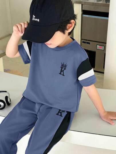 SHEIN 2pcs/Set Young Boys' Casual Comfortable Versatile Contrast Color Block Round Neck Short Sleeve Top And Drawstring Pants Set, Suitable For Spring And Summer