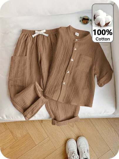 SHEIN 2pcs/Set Young Boys Casual Sports Vacation Clean Style, Cute, Kpop Solid White Polo Shirt And Solid Color Elastic Waist Pocket Pants Outfit Set, Suitable For Kids Outfits, Young Boy Clothes, Back To School Boys Set, Suitable For Birthday Parties, Evening Parties, Performances, Weddings, Valentine's Day, Suitable For Daily Use, School, Travel, Sports, Spring And Summer