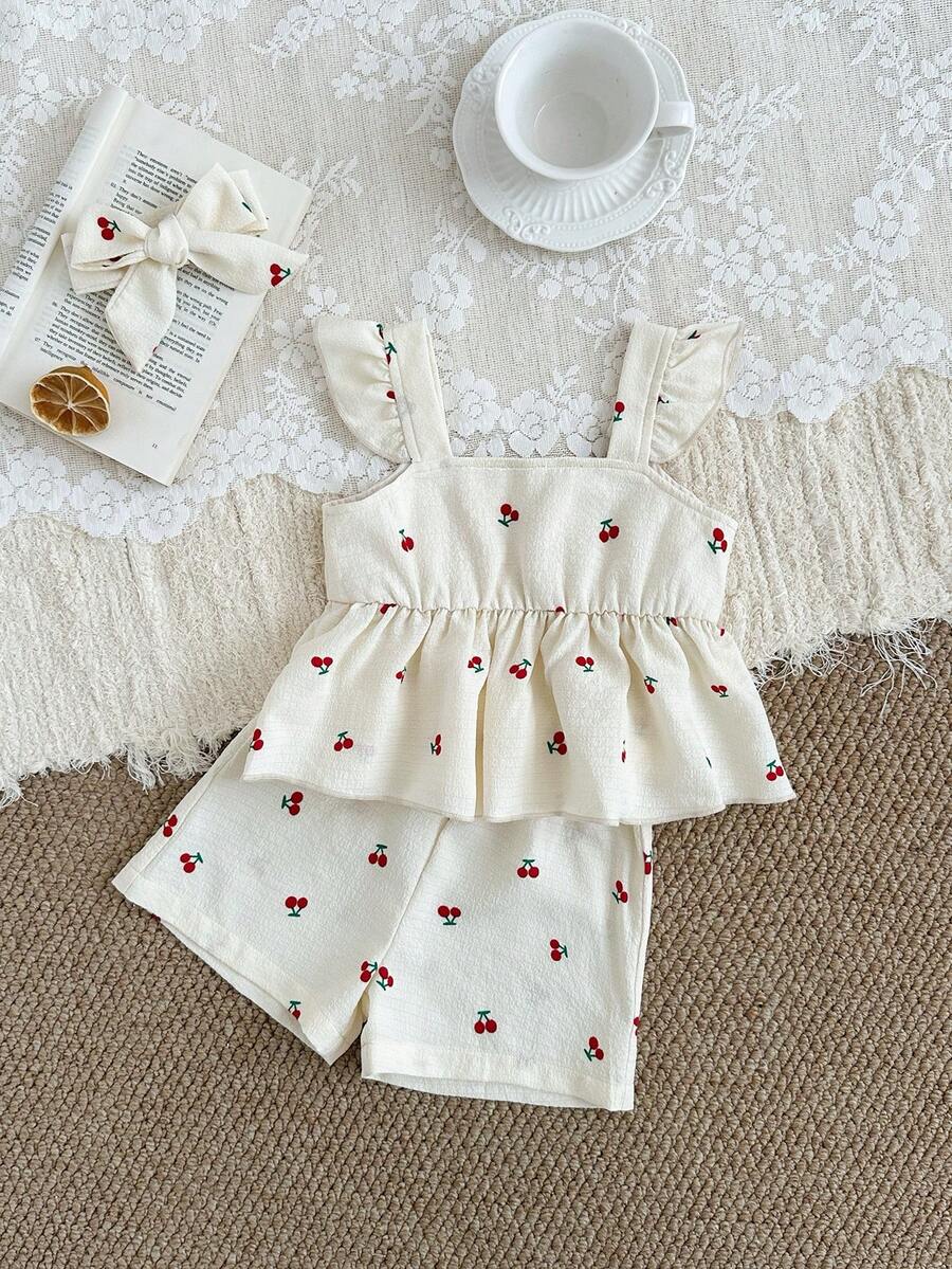 SHEIN 两件套女婴夏季套装，可爱樱桃印花吊带背心搭配松紧腰短裤和发带，柔软舒适，适合春夏外出，是送给6个月至3岁宝宝的绝佳礼物。 - 杏色 - 查看 1