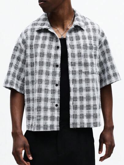 SUMWON Chemise à manches courtes surdimensionnée pour hommes avec imprimé à carreaux et col étalé pour le port casual en été