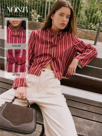 Nöista 这款长袖衬衫采用立领和纽扣前襟设计，修身剪裁，融合了传统中国元素和现代条纹细节，打造出复古现代的风格；适合文艺、休闲或略微正式的场合，易于搭配牛仔裤或简约连衣裙，是女士冬季穿搭、精致日常造型、节日圣诞装扮和优雅新年装束的百搭之选。