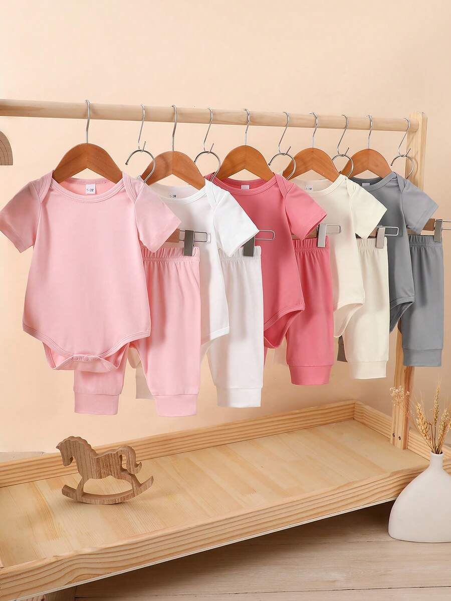 SHEIN Bộ quần áo 5 món cho bé sơ sinh | Gồm áo liền quần tay ngắn + quần dài màu hồng/be/nâu/trắng, chất liệu vải cotton co giãn, viền may tinh tế, dễ thương và thân thiện với làn da, phù hợp cho mùa xuân/thu, dự tiệc và dã ngoại. - Nhiều màu - Xem 1