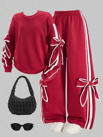 Sparklyn 两件套少女宽松休闲时尚花瓣袖撞色蝴蝶结上衣搭配条纹阔腿裤套装，适合日常、通勤、休闲、聚会、秋冬季穿着。