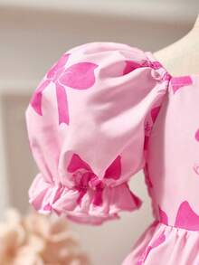 可爱女宝宝休闲简约粉色夏季连衣裙，饰有蝴蝶结图案。适合生日派对、聚会、演出、婚礼、洗礼、开幕式、日常穿着、上学、旅行以及春夏季节。夏季连衣裙、幼儿连衣裙、蝴蝶结连衣裙、幼儿粉色蝴蝶结连衣裙、蝴蝶结印花连衣裙、粉色幼儿连衣裙、2T粉色蝴蝶结连衣裙、婴儿泡泡袖连衣裙、粉色丝带连衣裙 - 粉色 - 查看 6