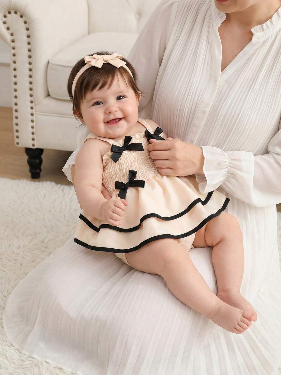 女婴优雅甜美风荷叶边蝴蝶结装饰无袖多层连体衣，轻盈柔软透气，飘逸舒适，适合日常穿着和可爱拍照，春夏时尚套装 - 杏色 - 查看 1