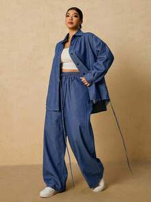 SHEIN Tall CURVE 大码女式长袖单排扣系带衬衫搭配阔腿牛仔裤休闲两件套，适合冬季、圣诞节、新年、感恩节、通勤、度假、毕业典礼等场合，兼具时尚感和Y2K风格，可爱街头风，适合派对、婚礼、商务休闲等各种场合。舒适的牛仔两件套，休闲长袖上衣搭配抽绳腰带阔腿牛仔裤，适合节日聚会等日常穿着。 - 中等水洗藍 - 查看 3