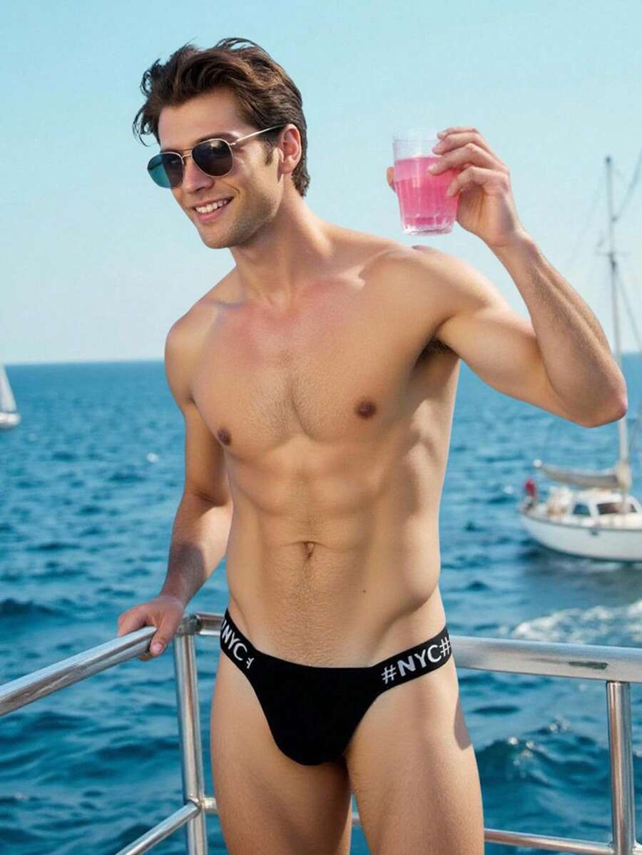 Manfinity Swimmode 男士夏季海滩度假风字母印花黑色泳裤 - 黑色 - 查看 1