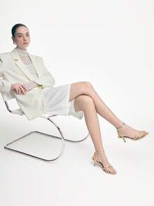 Mnmlis Sandalias de tacón de aguja con tiras cruzadas de metal para mujer - Oro claro - Ver 7