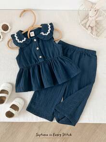 Cozy Pixies Bộ 2 món cho bé gái: áo cardigan không tay cổ bèo phối màu tương phản và quần cạp chun. - Xanh đậm - Xem 5