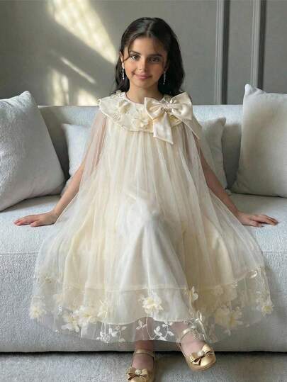 SHEIN Loose Casual Round Neck Sleeveless A-Line Dress With 3D Flower Decoration And Oversized Bow, Suitable For Weddings, Birthdays, Holidays, Parties In Apricot And Champagne Colors Loose Casual Round Neck Sleeveless A-Line Dress With 3D Flower Decoration And Oversized Bow, Suitable For Weddings, Birthdays, Holidays, Parties Little Kids Elegant Dress Baby Elegant Dress Baby Girls Champagne Dress Party Dress For Young Girls