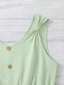 Emery Rose Kids Emery Rose Kids Bộ áo liền quần kiểu vest xoắn cho bé gái tuổi teen, có cúc cài phía trước, được trang trí bằng chất liệu dệt họa tiết, thích hợp cho các chuyến đi chơi mùa xuân, phong cách đồng quê, tiệc trà chiều trong vườn, dạo phố, đi học, và cả mẹ lẫn bé. - Màu xanh chanh - Xem 5