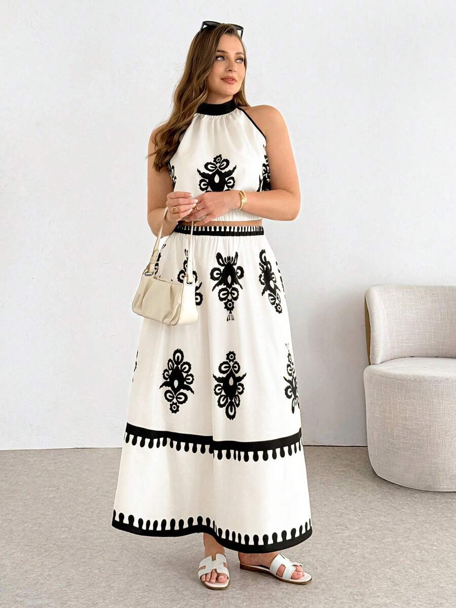 SHEIN Essnce Damen Mode in Große Größen Frühling/Sommer lässig, locker und bequem schwarzer geometrischer Muster Crop Top und lange Rock apricotfarbenes Zweiteiler Set, Sommerkleidung, Urlaubsoutfits, Strandurlaubs-Outfits für Frauen - Aprikosenfarben - Übersicht 1