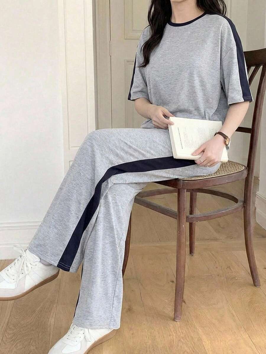 2件套少女休闲运动家居服纯色拼接宽松圆领短袖T恤和阔腿裤返校套装，灰色和藏蓝色针织圆领宽松落肩休闲套装，简约休闲街头运动休闲两件套，返校套装，可爱假日家庭户外春季野餐日常休闲两件套，适合各种场合 - 灰色 - 查看 1