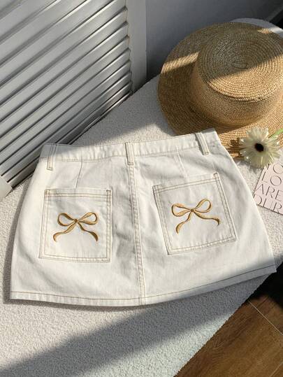 Comfortcana Minifalda vaquera de talle bajo y línea A que estiliza la figura de la mujer