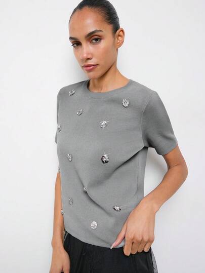 Maija Blusa de punto de manga corta con cuello redondo, decoración floral de lentejuelas, uso versátil y casual para uso diario, verano para mujeres, vacaciones de verano, primavera para mujeres, top de fiesta, playa para mujeres, top para salir, elegante, top con lentejuelas, top brillante