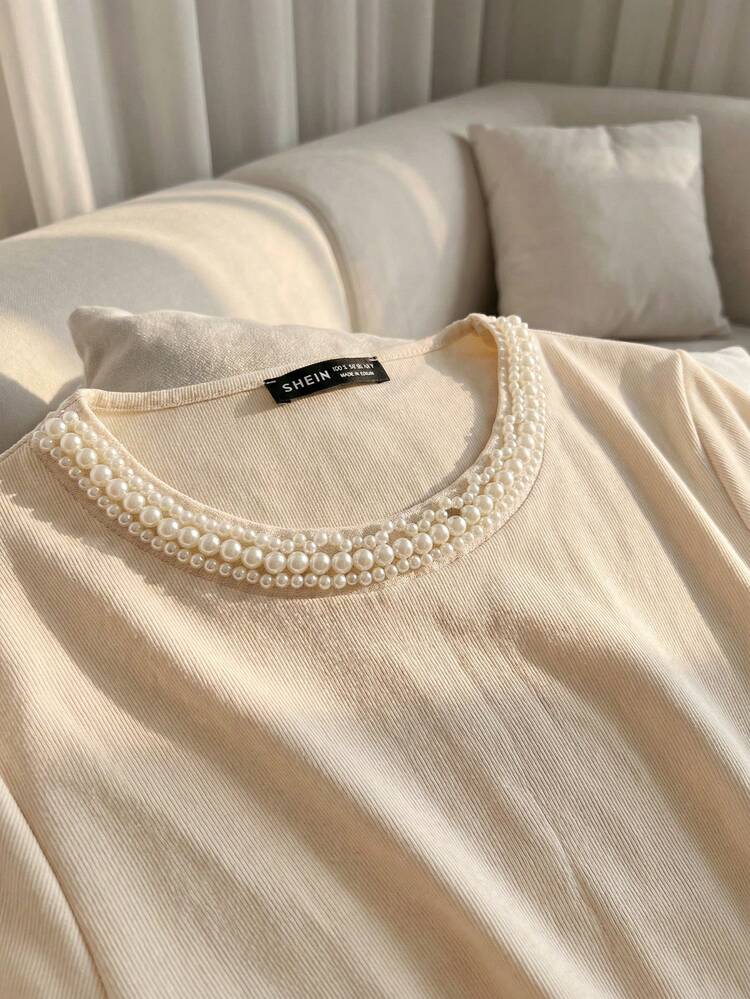 Franclia Camiseta de mujer de cuello redondo de manga corta color albaricoque sólido con adornos de perlas falsas, ajustada, de tela de punto suave y cómoda. Hermosa, exquisita y elegante, adecuada para el uso diario, top de estilo francés, desde la primavera hasta las vacaciones de verano - Albaricoque - Añade 3