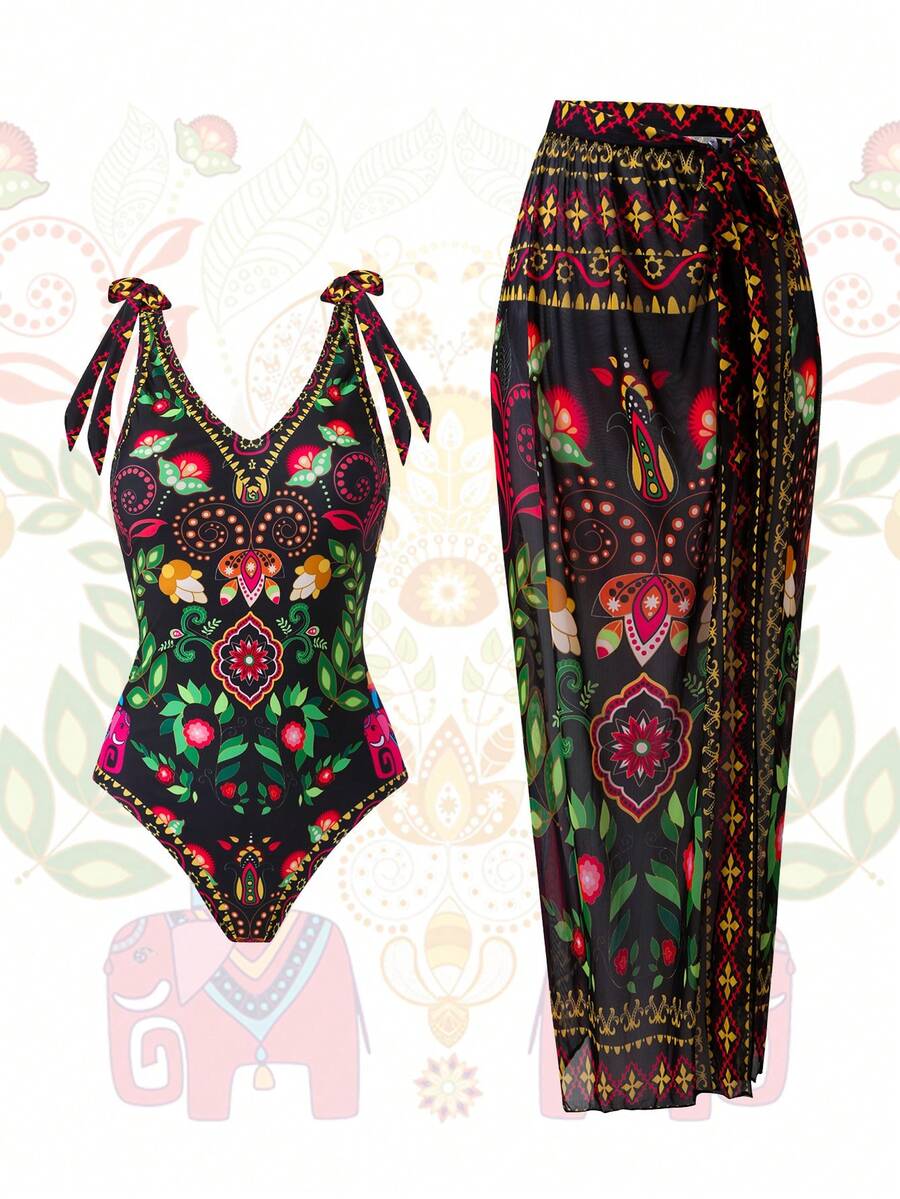 Swim Oasis 大码女士时尚连体泳衣，配有可拆卸裙摆、V领、肩部系带和优雅印花网纱裙，修身显瘦，适合度假和派对穿着 - 彩色 - 查看 1