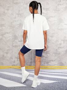 SHEIN Set de 2 piezas con camiseta de manga caída con estampado y shorts de color contrastante para adolescentes - Azul Marino - Ver 2