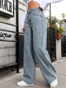 1 par de elegantes vaqueros de pierna ancha, con corte recto, bolsillos delanteros y cierre con botón, lo que los convierte en la opción perfecta para el día a día. - Jeans 2039 - Ver 1