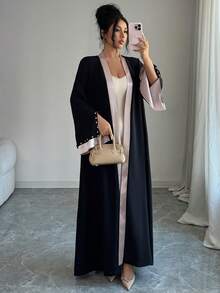 Al Najma Women's Elegant Minimalist Contrast Color Cuff Rhinestone Embellished Long Sleeve Abaya - Black - View 6