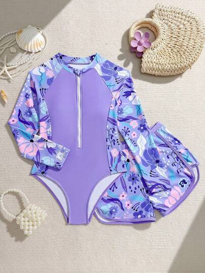 Traje de baño de una pieza con estampado de hojas, mangas, cierre delantero y shorts de unicolor, adecuado para surf en la playa, apropiado para el verano.