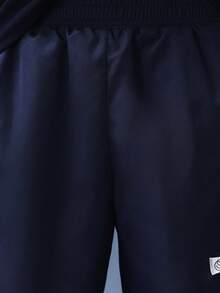 SUMWON 经典沙滩泳裤，白色撞色滚边，侧边口袋，适合夏季度假 - 黑色 - 查看 7