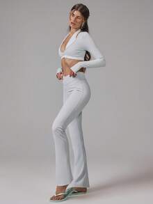 Musera Sport Bộ đồ thể thao năng động gồm áo croptop tay dài cổ yếm phối màu tương phản và quần legging ống loe cạp chéo, thích hợp cho tập luyện thể thao, tập gym, pilates, thể dục, mặc hàng ngày. - Màu xanh nhạt - Xem 2