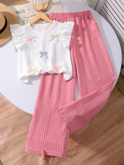 SHEIN Sparklyn 2 Parça/Set Kız Çocuk Günlük Tişört Takımı, Düz Renk, Geniş Kollu, Dokulu, Renkli İplik Fiyonklu Üst ve Geniş Paçalı Pantolon Takımı, Günlük Geziler veya Plaj Seyahatleri İçin Uygundur