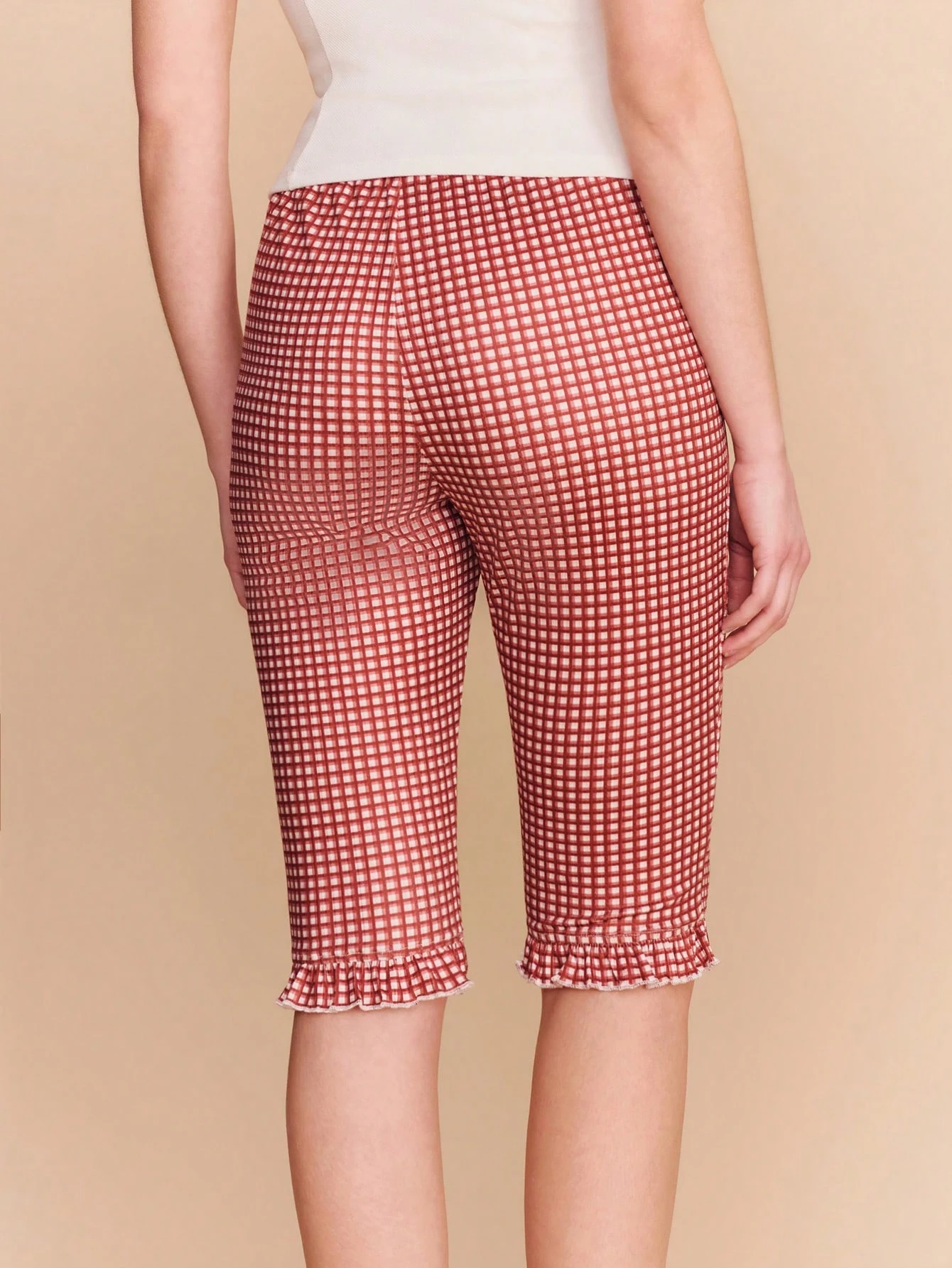 Schwarze Capri-Hose mit Jacquard-Strick, weißem Blumenmuster und Rüschendetails, süßer Stil