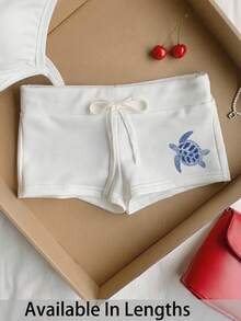 Comfortcana Quần short nữ dáng ôm màu trắng, tối giản, in hình rùa biển xanh trắng, cạp chun, dây rút – Thích hợp mặc đi biển mùa hè và nghỉ dưỡng bên bờ biển, thoải mái cho mùa xuân/hè, dễ thương, mềm mại, phong cách boho, đảo nhiệt đới, lễ hội, hẹn hò, lễ hội âm nhạc và kỳ nghỉ xuân. - trắng - Xem 3