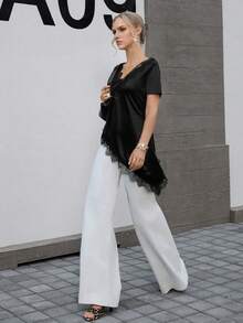 Opuloom 女士时尚优雅荷叶边领蕾丝边吊带背心，适合情人节、婚礼、节日、休闲外出、派对等场合，采用不对称下摆和弹力面料。 - 黑色 - 查看 5