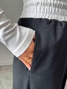 Elenzga Pantalones anchos casuales y cómodos para mujer, en bloque de color negro y blanco, con cordón en la cintura, pantalones de chándal sueltos y versátiles para ir al trabajo, ocio, vacaciones, que estilizan y alargan la figura con pantalones negros - Blanco y Negro - Ver 6