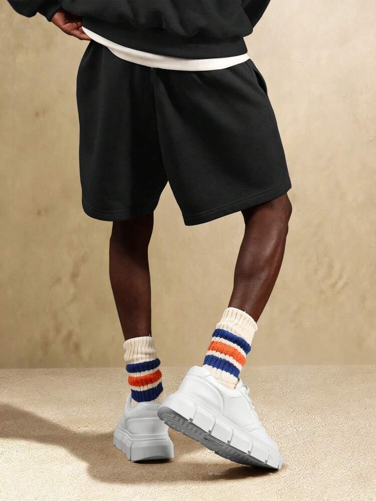 Sweatshorts mit tiefem Schritt und umgeschlagenem Saum