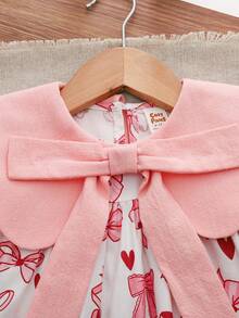 Cozy Pixies Đầm bé gái in hoa, cổ tròn, tay phồng, thắt eo, nơ to. - Nhiều màu - Xem 8