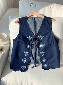 Comfortcana Áo khoác denim nữ thêu hoa, thắt nơ phía trước, thích hợp cho kỳ nghỉ hè, trang phục mùa xuân, áo nữ dự lễ Phục sinh, trang phục ngày Thánh Patrick, trang phục đi biển cho nữ, áo nữ đi chơi, trang phục đi nghỉ mát, áo kiểu nữ thường ngày, áo nữ màu xanh dương, áo khoác denim thêu không tay cổ chữ V thắt nơ phía trước, viền ren. - Rửa tối - Xem 4