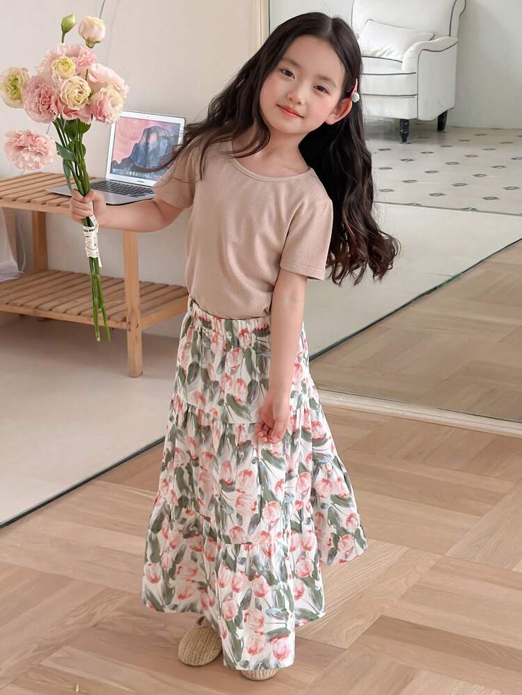 Young Girl Solid Color Round Neck Short Sleeve T-Shirt And Floral Print Ruffle Hem Skirt Casual Outfit