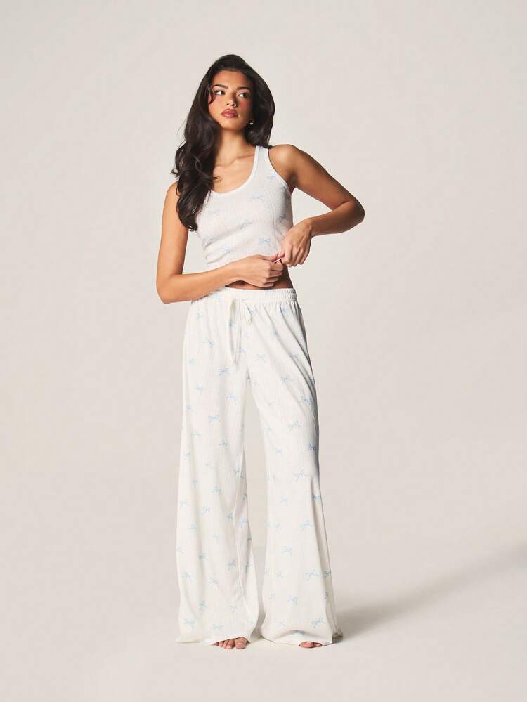 MISSGUIDED リボン柄プリントタンクトップとワイドレッグパジャマパンツのルームウェアセット、睡眠やくつろぎに最適