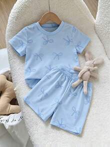 SHEIN Genkimix Kids 2件套 女童休闲甜美日常圆领短袖露脐T恤，带3D蝴蝶结装饰和松紧腰短裤 - 彩色 - 查看 4